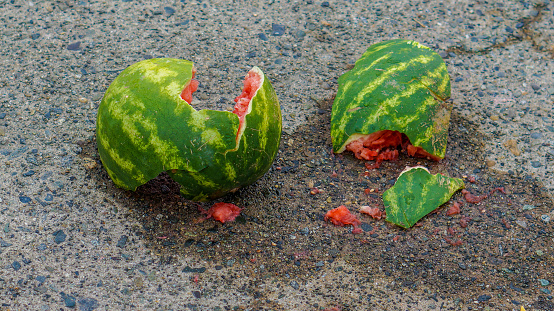 broken watermelon on the ground 