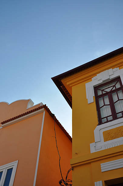 istock Peach and orange houses 492580180