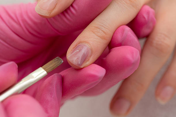 istock fingernail painting detail 492580716