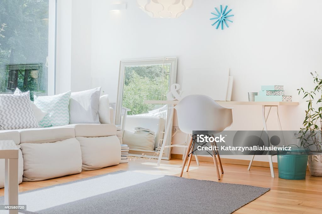 Bright cozy room Bright small cozy room with sophisticated decorations Domestic Room Stock Photo