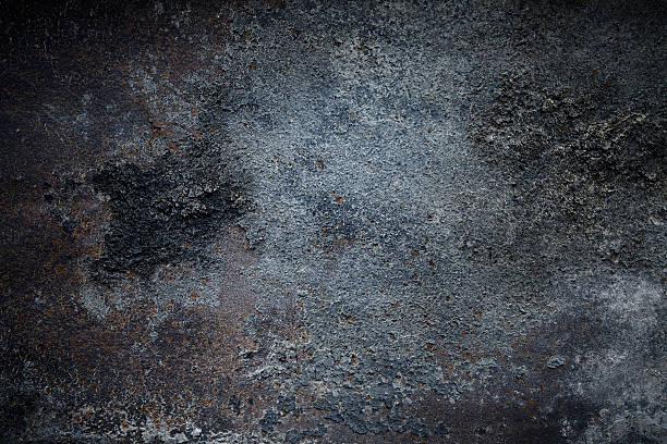 surface en métal rouillé foncé - metal rusty textured textured effect photos et images de collection