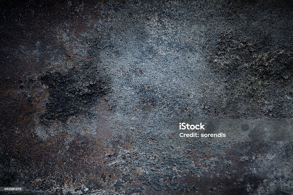 Dark rusty metal surface Overhead view of Dark rusty metal surface Metal Stock Photo