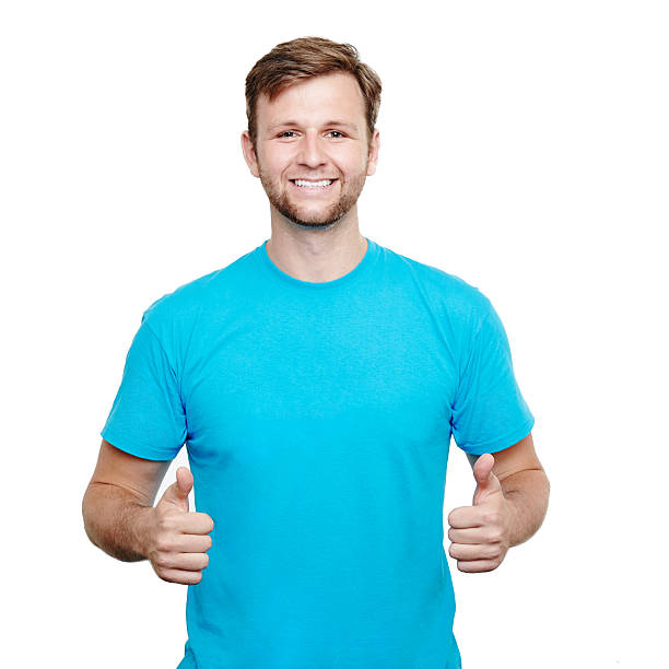 istock Smiling young man showing thumbs up 492581402