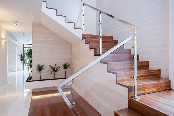 Stylish staircase in bright interior Image of stylish staircase in bright house interior house railing stock pictures, royalty-free photos & images