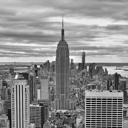 NEW YORK CITY, USA - OCTOBER 24, 2014: Manhattan Midtown skyline on cloudy day. New York City is the cultural and financial capital of the world