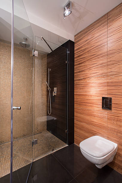 istock Bathroom with wall imitating wood 492583860