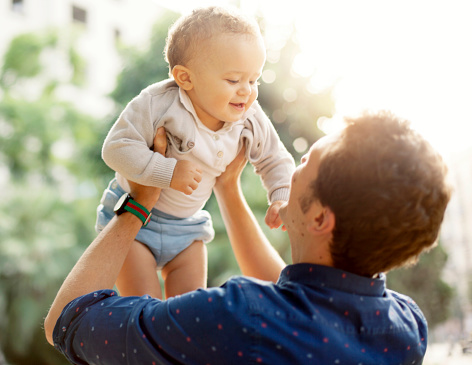  Father and toddler outdoors 