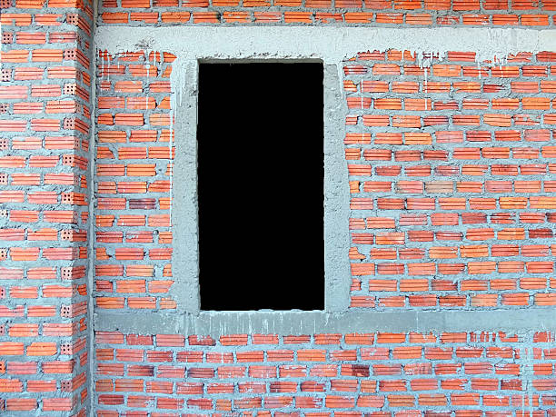istock window in grungy old abandoned building 492586408