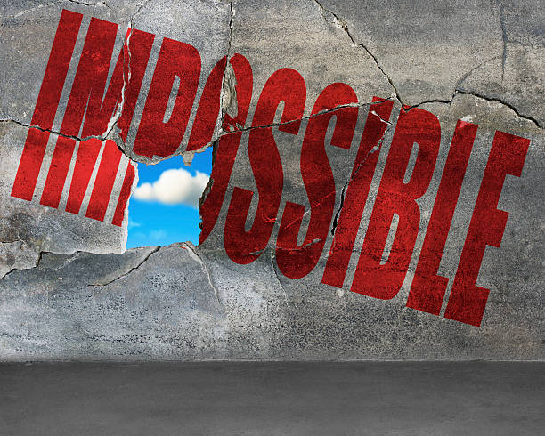 istock Hole on cracked wall with impossible and sky outside 492594729