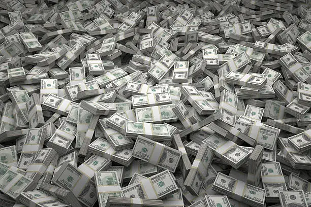 Photo of Money Pile Bundles of $100 USD Notes