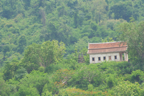 The old temple situated on the hill in Luang Prabang town, Loas country.
