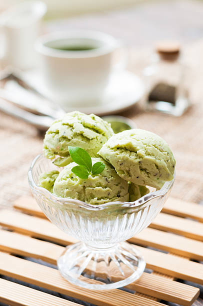 istock Green Tea Ice Cream on white wood board 492596774