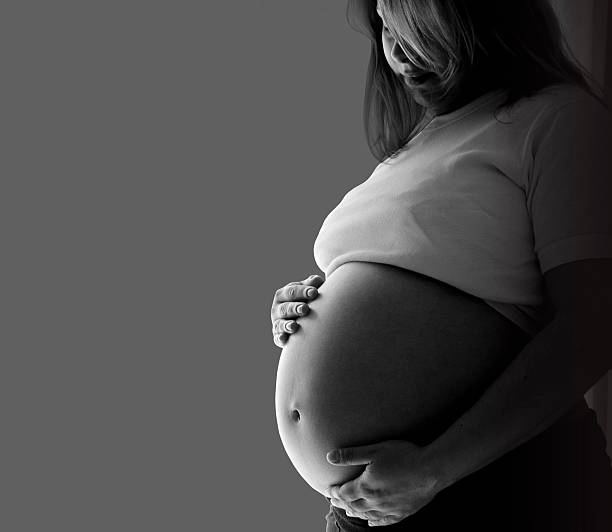 istock Pregnant woman black and white 492597085