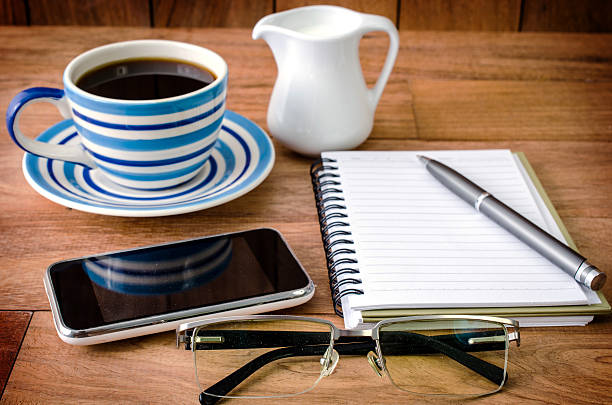 istock Eye Glasses and a coffee and Mobile phone 492597699