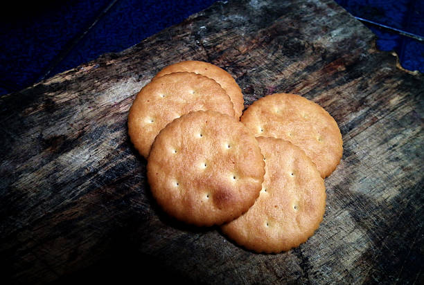 istock cookies over brown  wooden background 492597777