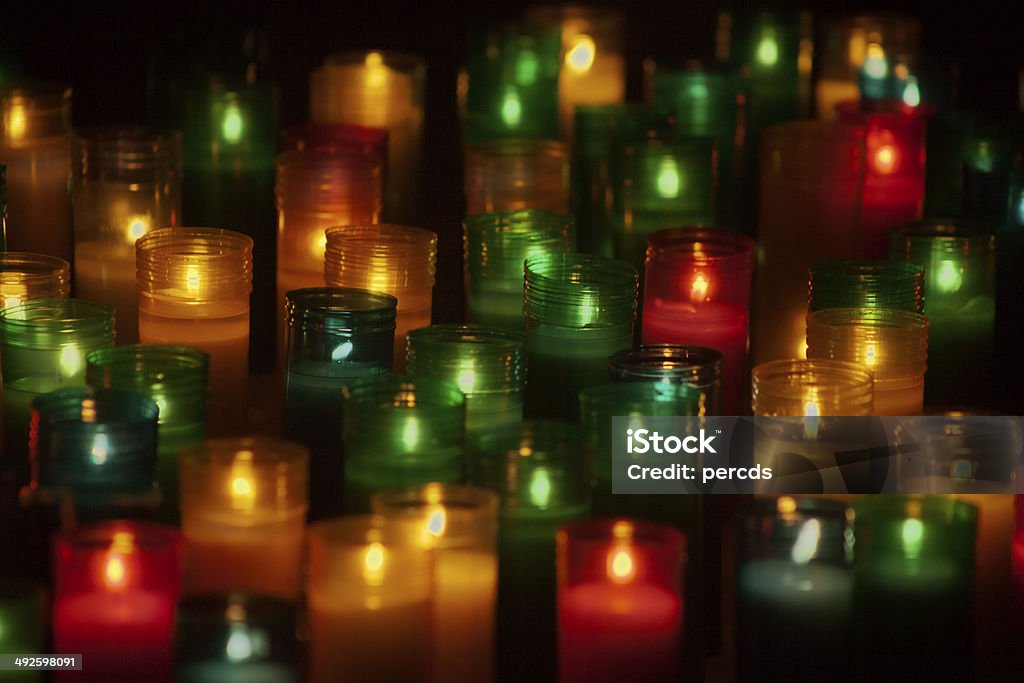 Multicolored candles Close up of multicolored candles, black background. Backgrounds Stock Photo