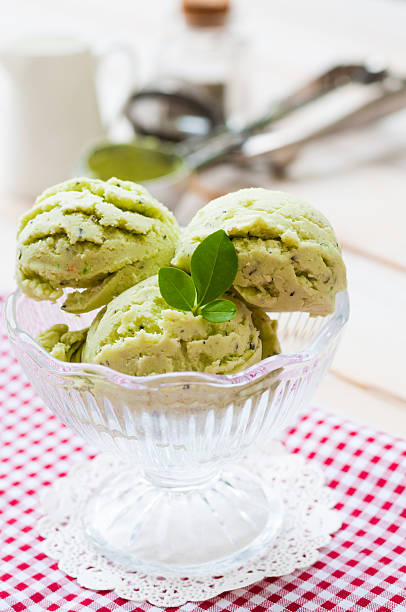 istock Green Tea Ice Cream on white wood board 492598640