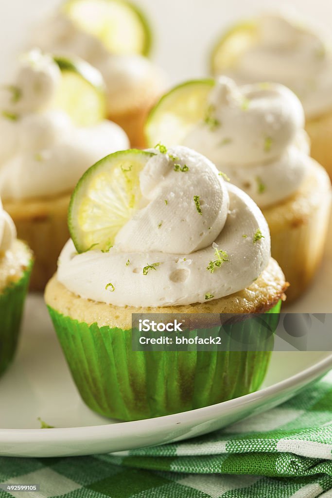 Homemade Margarita Cupcakes with Frosting Homemade Margarita Cupcakes with Frosting and Limes Cupcake Stock Photo