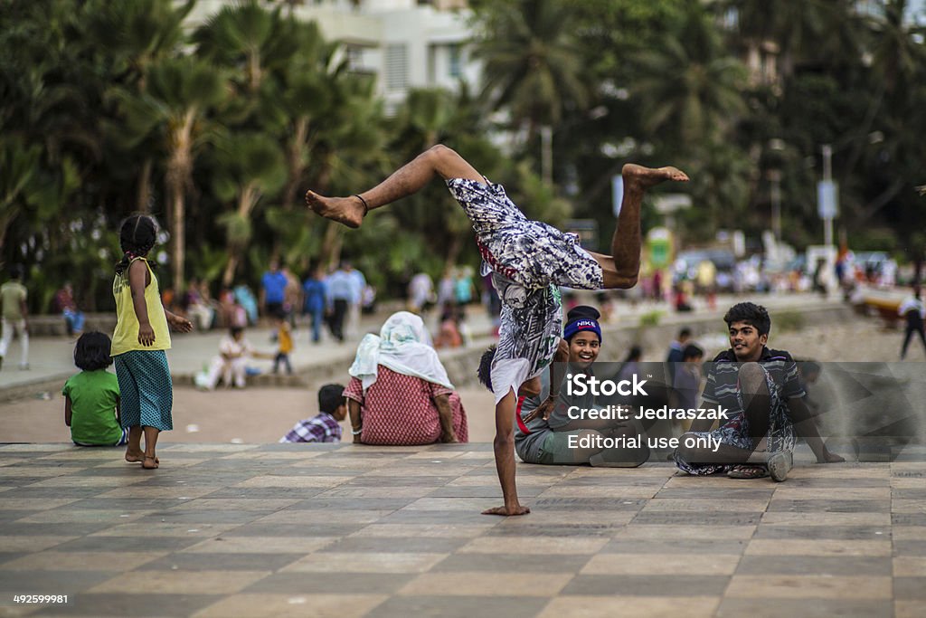 Bandra_breakdance Mumbai, India - May 21, 2013: Guy preforming breakdance in the afternoon at a open space in Bandra, Mumbai Active Lifestyle Stock Photo