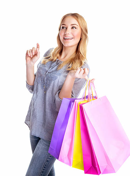 istock Cheerful female with paper bags 492600011