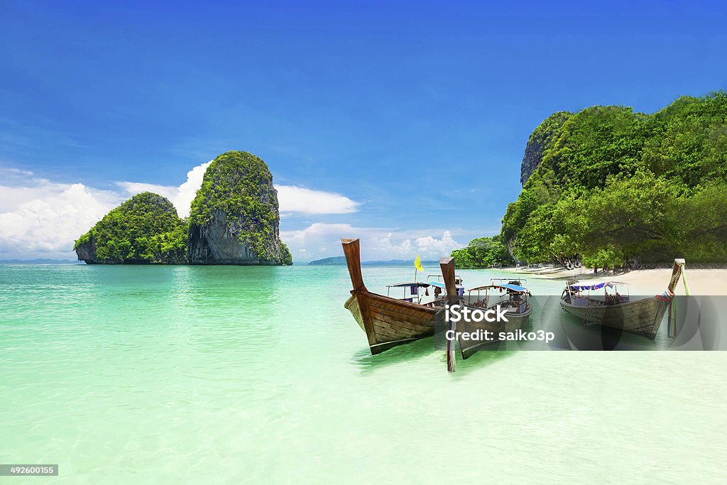 Beauty beach Beauty beach and limestone rocks, focus on the boats Thailand Stock Photo