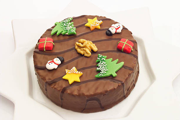 istock Walnut cake with chocolate coating and marzipan deco 492600256