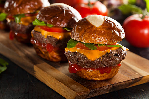 istock Homemade Cheeseburger Sliders with Lettuce and Cheese 492600471