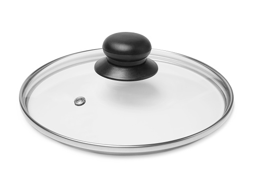 Glass lid from a pot or a pan on white background