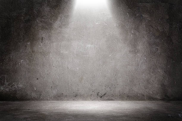 Wall Background Under the spotlights spotlight stock pictures, royalty-free photos & images