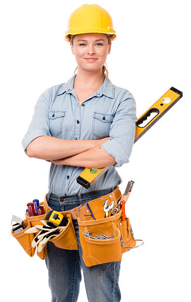 istock Confident Young Woman Construction Worker on White 492604650