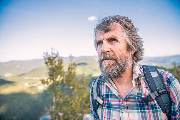 istock Senior Man Hiking in the Mountains 492604776
