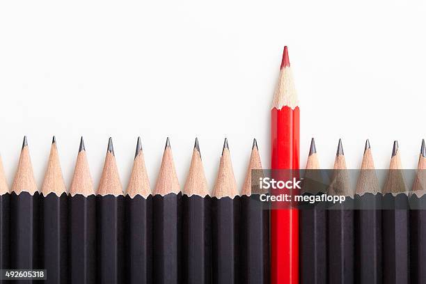 Red Pencil Standing Out From Crowd Stock Photo - Download Image Now - Standing Out From The Crowd, Crowd of People, Concepts