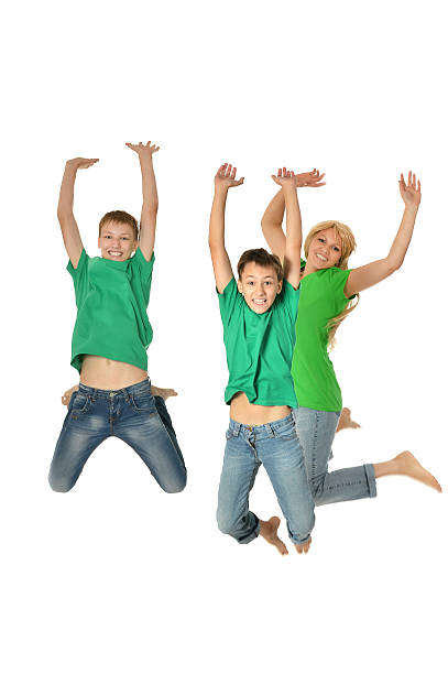 istock Mother and sons jumping 492605342