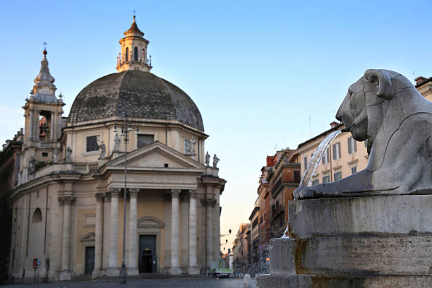 Lion fountain in Piazza del Popolo in Rome, Italy stock photo