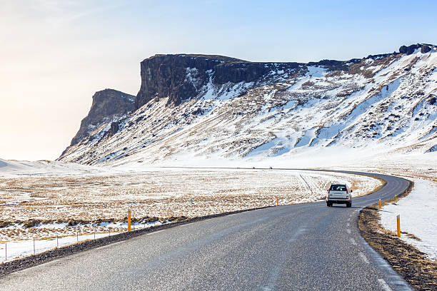 istock Road Winter Mountain Iceland 492605860