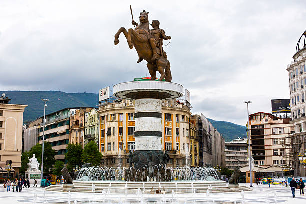 Skopje, Macedonia - September, 30, 2015: Statue of Alexander the Great on main square in downtown of Skopje, fountain and people walking around