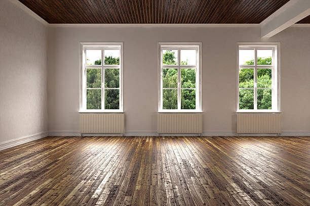 istock 3d rendering. blank interior. White walls. Wooden floor 492608284