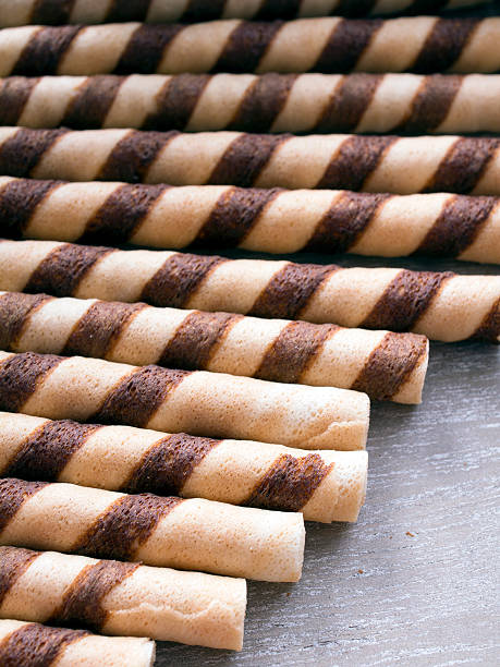 istock Waffle striped rolls on grey wooden background 492608638