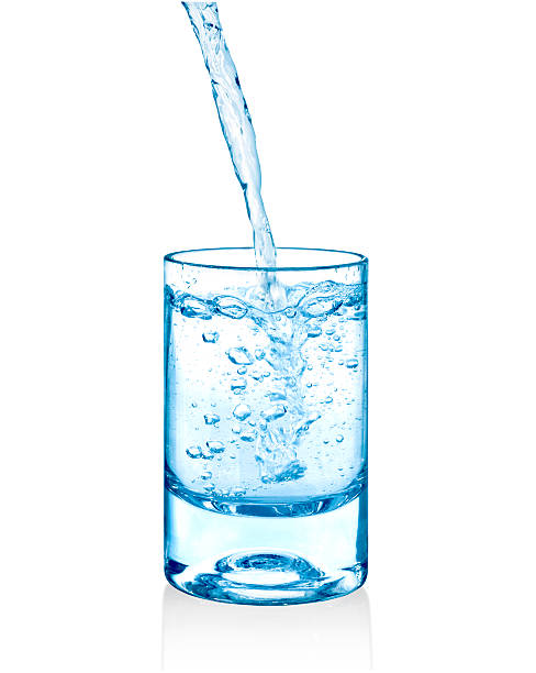 istock clear water being poured into a glass cup 492609744