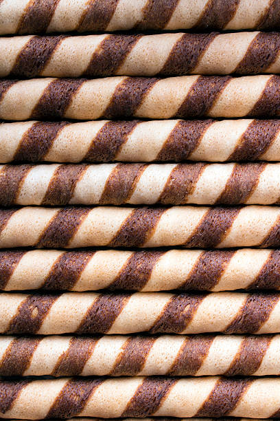 istock Waffle striped rolls on grey wooden background 492610928