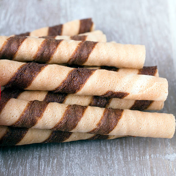 istock Waffle striped rolls on grey wooden background 492611908
