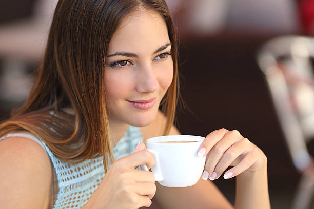 istock Candid woman thinking in a coffee shop 492612054
