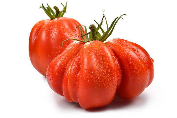 zwei beefsteak, tomaten mit tropfen 1 - beefsteak tomato stock-fotos und bilder