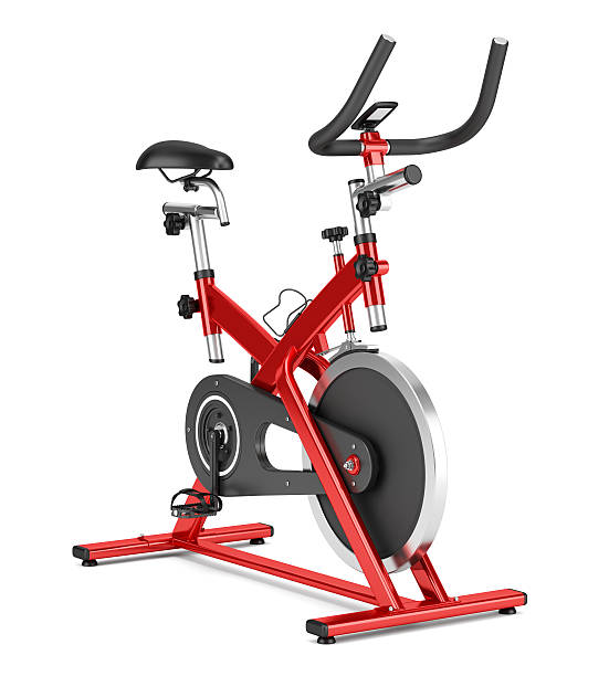 stationary exercise bike isolated on white background stationary exercise bike isolated on white background exercise bike stock pictures, royalty-free photos & images