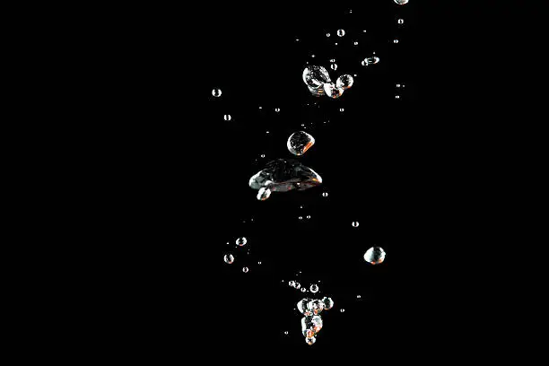 Photo of Bubbles water at black background