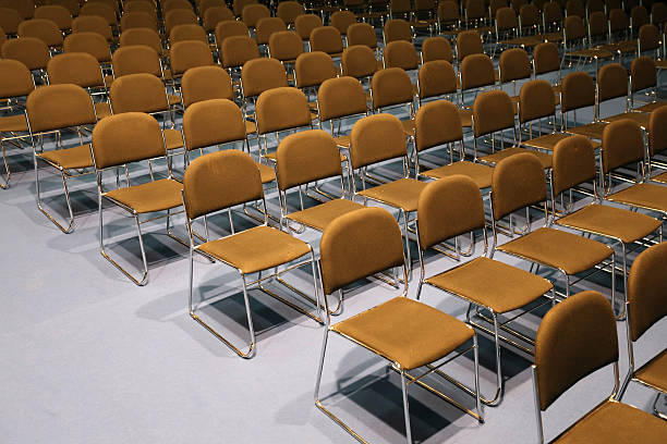 Conference room full of empty seats Endless rows of chairs in a modern conference hall home cinema system stock pictures, royalty-free photos & images