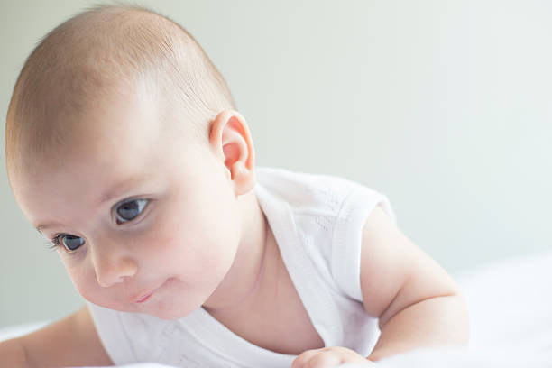 istock Beautiful Baby on White Towel 492621804