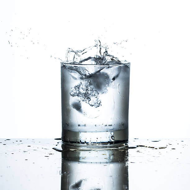 istock ice drop on glass of water 492623536