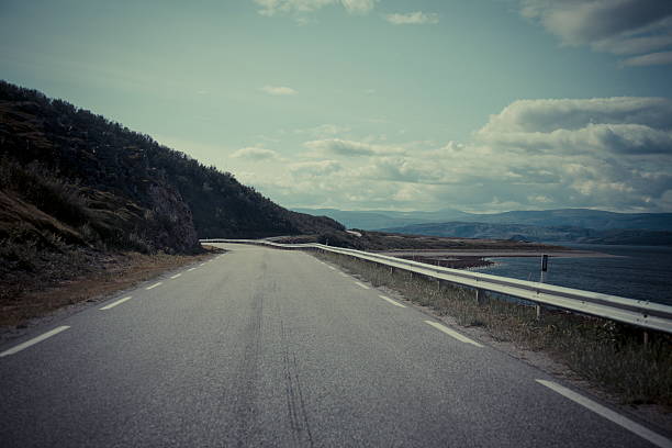 istock Norway lonesome street at coast 492624490