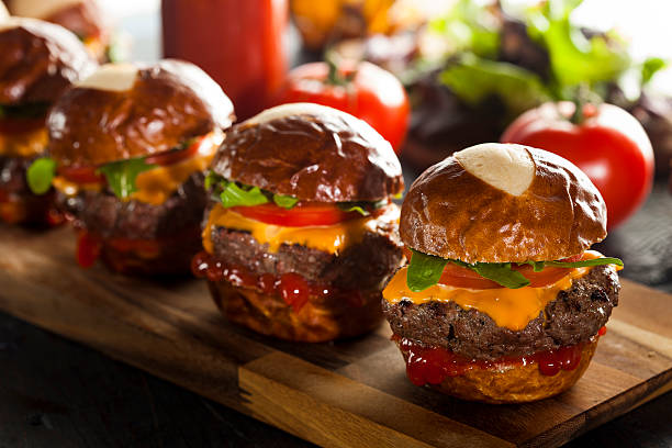 istock Homemade Cheeseburger Sliders with Lettuce and Cheese 492624907